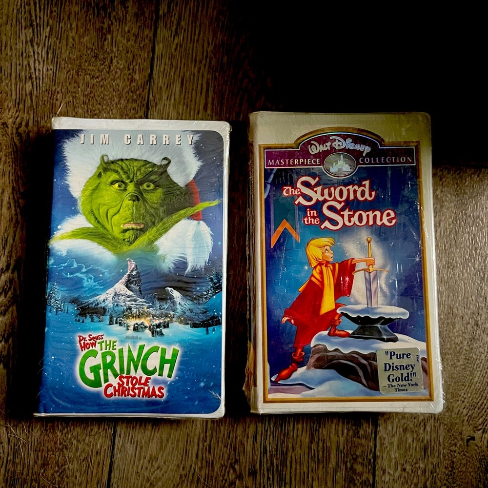 How the Grinch Stole Christmas vhs & Sword in the Stone vhs factory sealed.